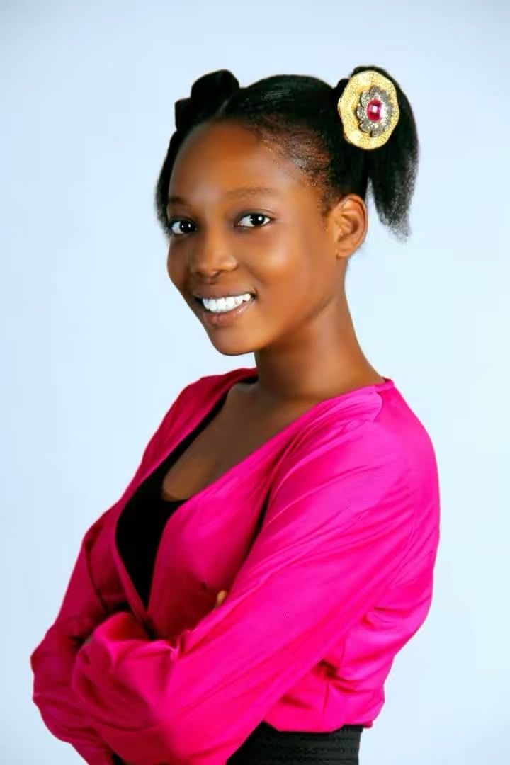 Eniola smiling